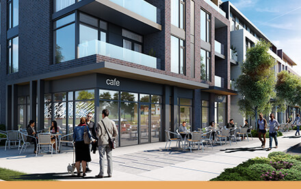 Ground floor of The Switzer with café and people walking by on Main Street