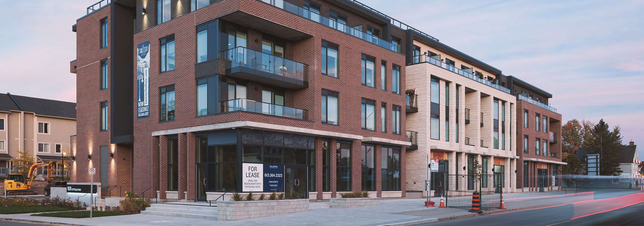 Two women walk past The Switzer on Stittsville Main Street